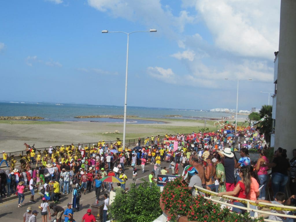 Photo from a balcony showing the parade below.