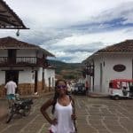 Photo of a girl standing on the street in Barichara, Colombia