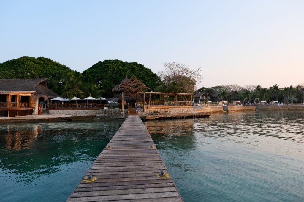 Photo of a pier leading to the entrance of the Cartagena Isla del Encanto resort.