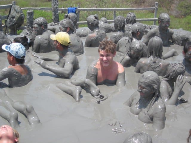Photo of people in the Cartagena volcano of mud.