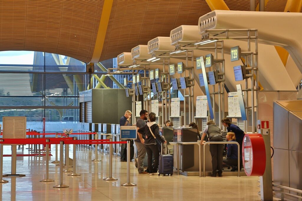 Travelers at an airport check in desk after getting a coronavirus test Cartagena Colombia.