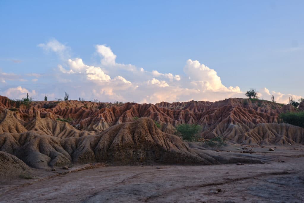Photo of wavy red hills in the Desert of Tatacoa's red section.