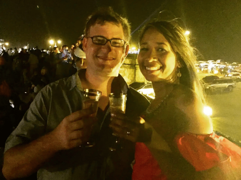 A couple toasting during Cartagena, Colombia New Years celebrations.